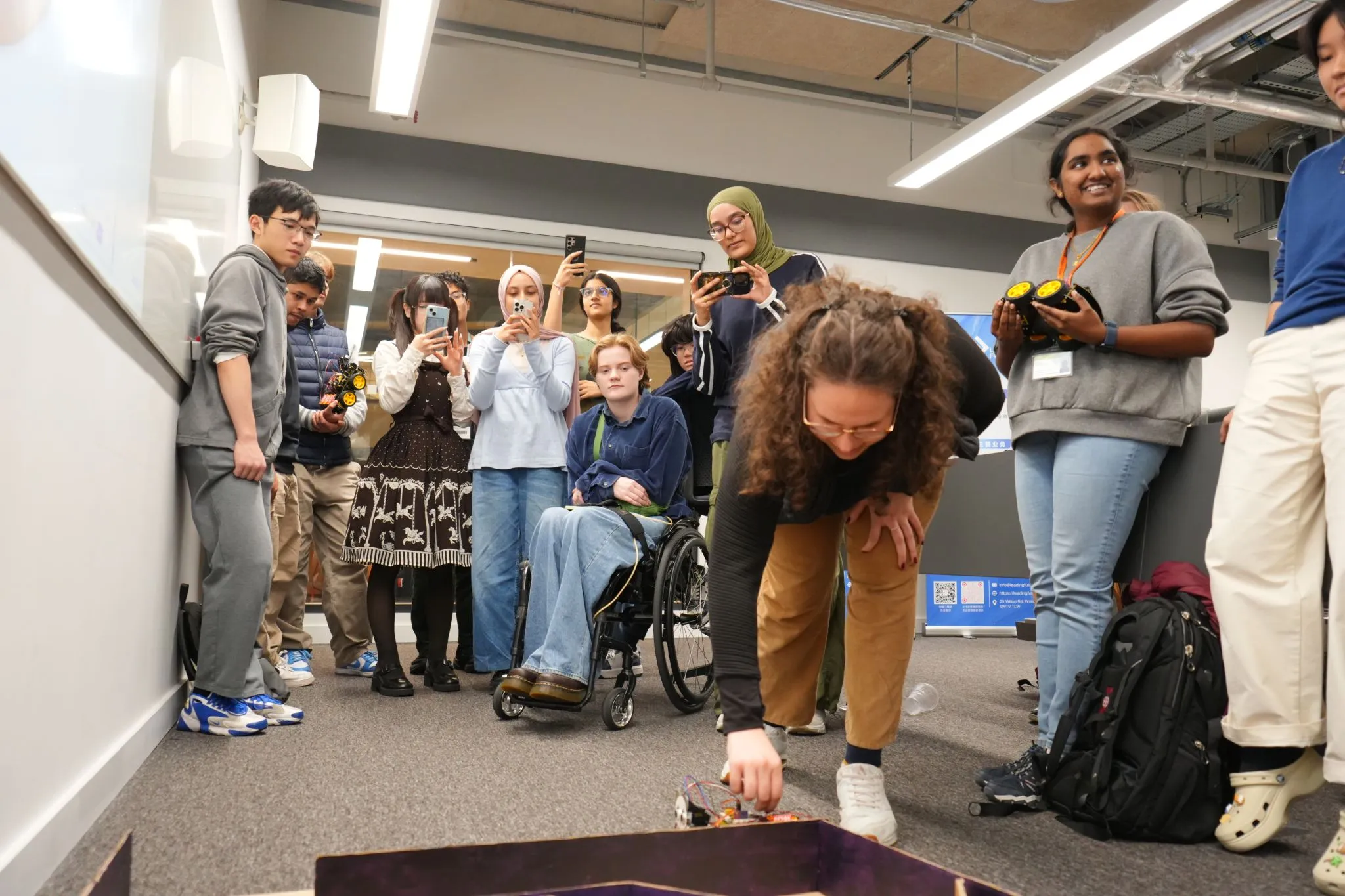 Society members working on a robotics build